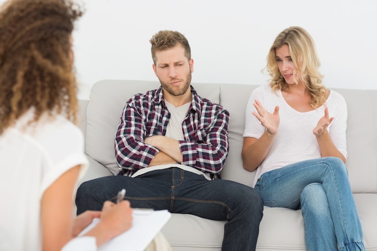 relationship counseling in Chicago with couple working through conflict and emotional connection with therapist